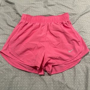 Pink Nike Athletic Shorts. Size was just too small for me. Only worn once.
